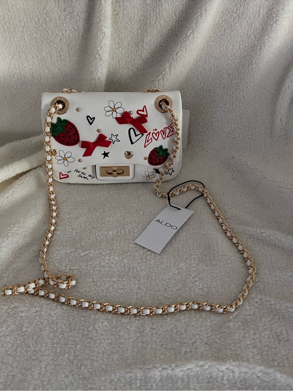 Aldo White Crossbody with Red Strawberry & Bow Accents